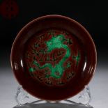 A Chinese Famille Verte Biscuit Dragon Dish