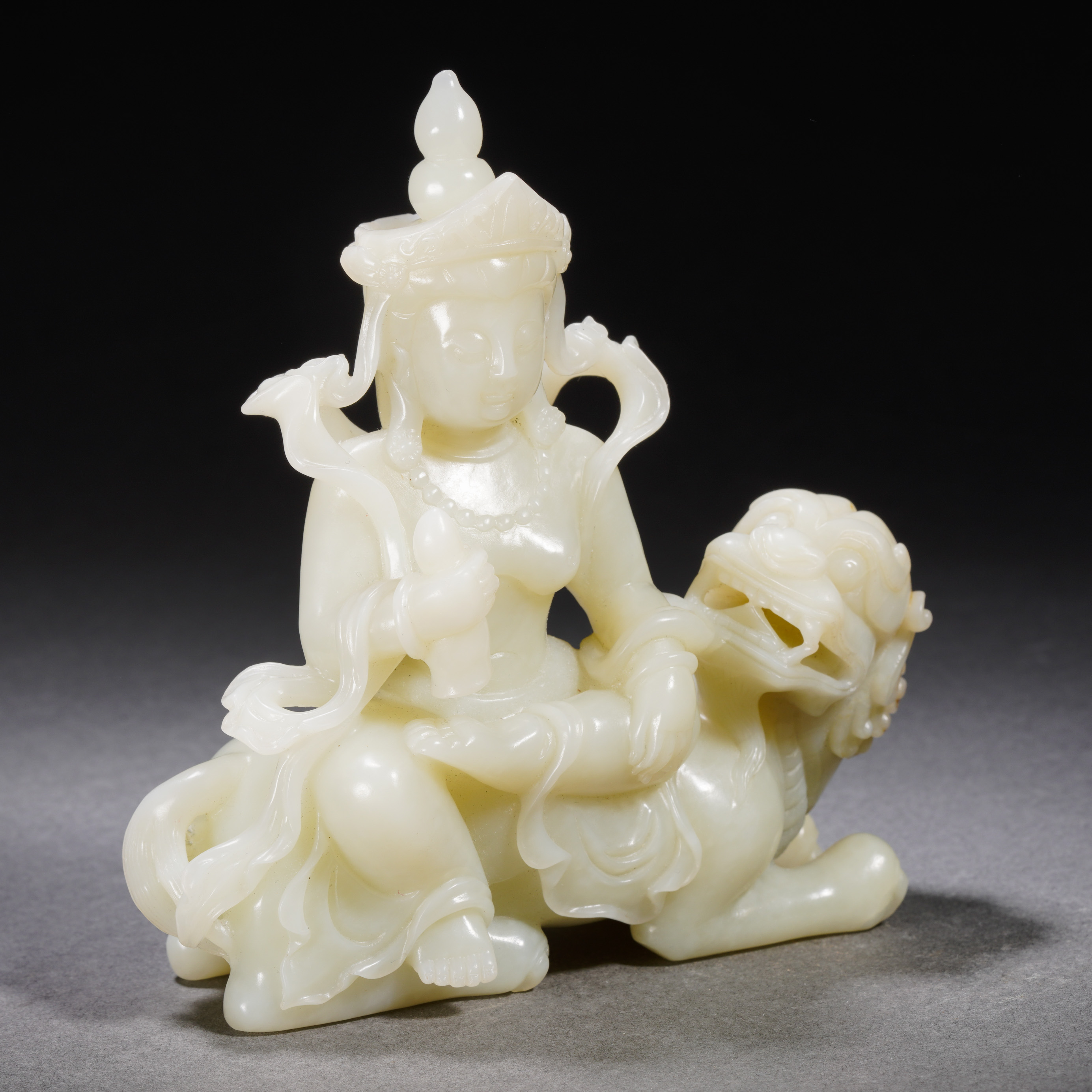 A Chinese Carved White Jade Bodhisattva with Lion - Image 8 of 13