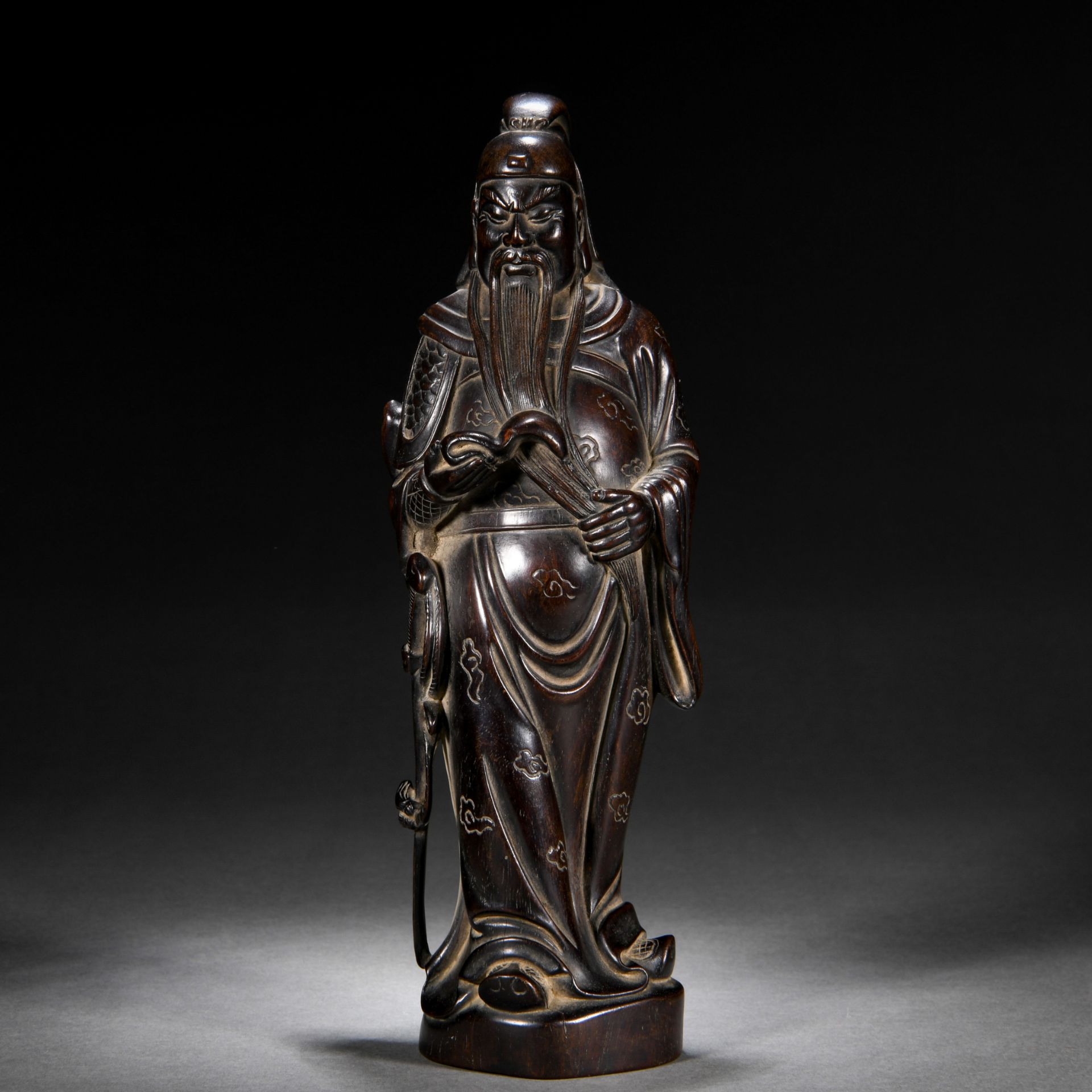 A Chinese Carved Rosewood Standing Figure