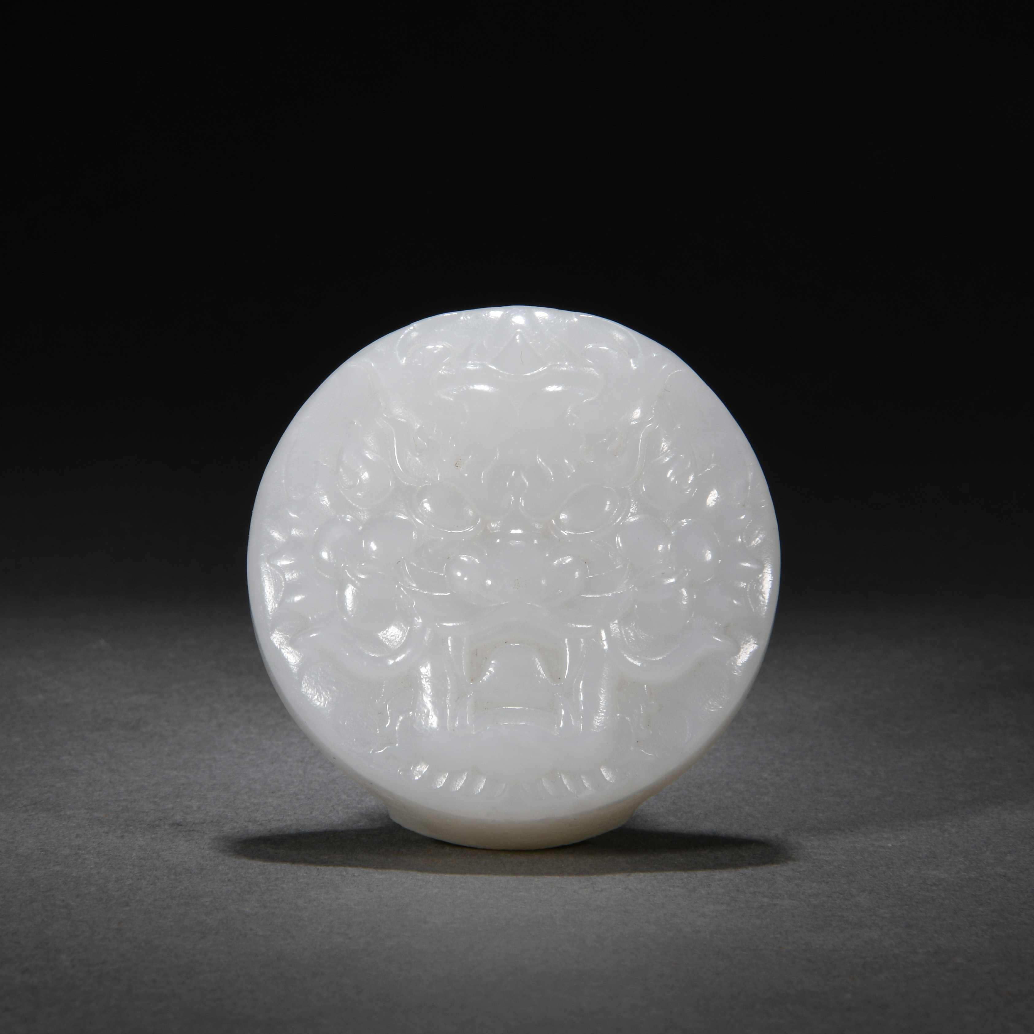 A Chinese Carved White Jade Belthook