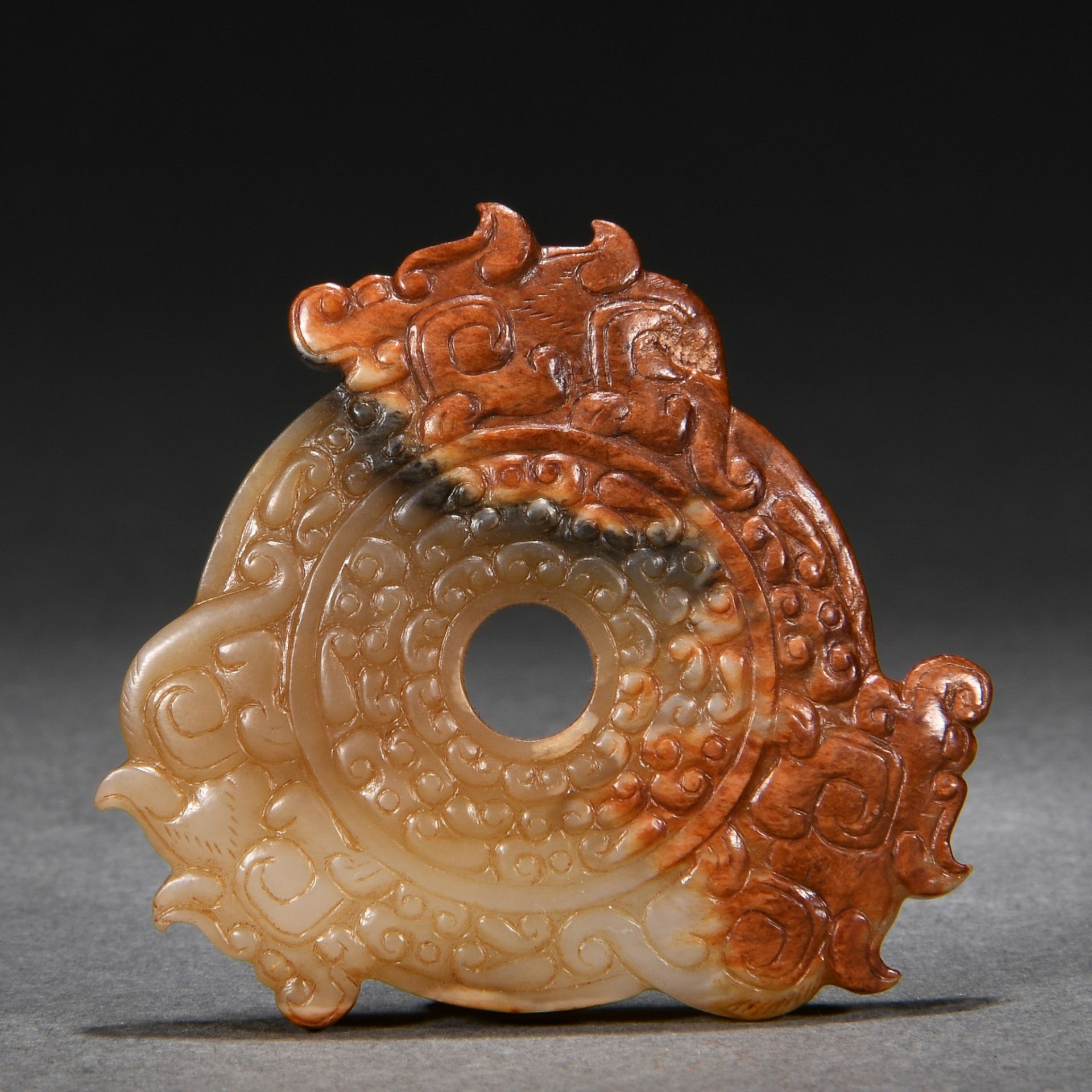 A Chinese Carved Jade Disc Bi