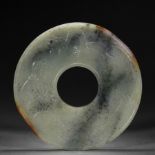 A Chinese Carved Jade Disc Bi