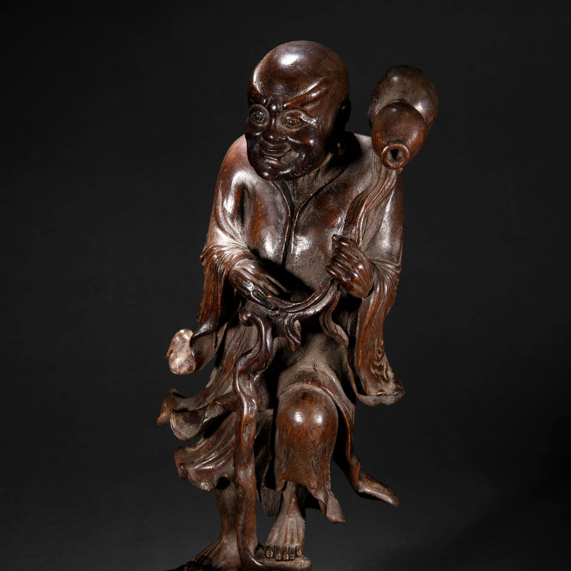 A Chinese Carved Rosewood Standing Figure - Image 3 of 8