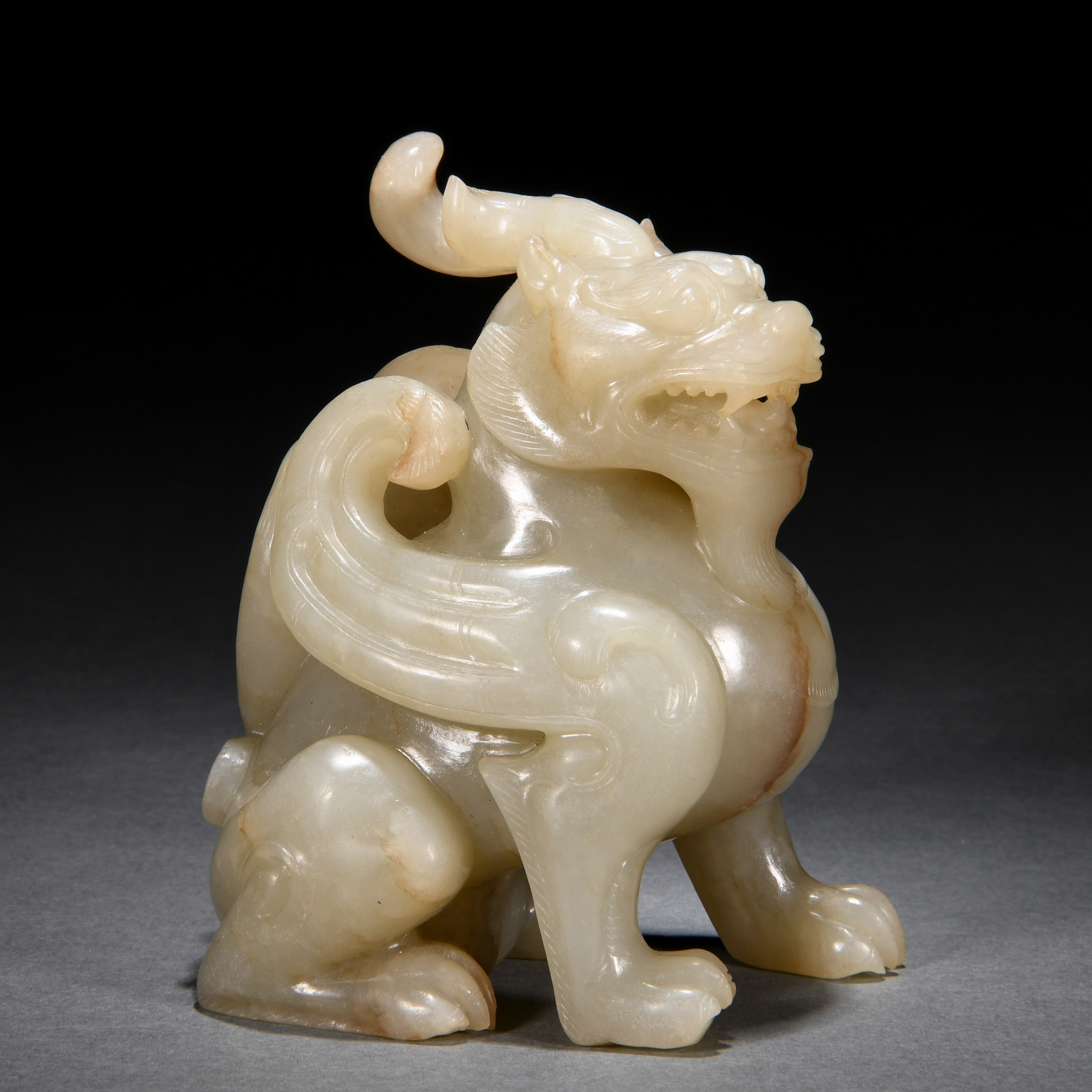 A Chinese Carved Jade Mythical Beast