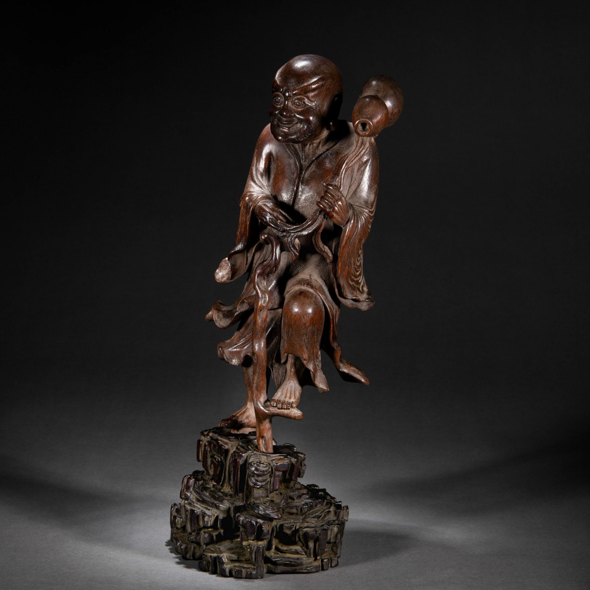 A Chinese Carved Rosewood Standing Figure - Image 2 of 8
