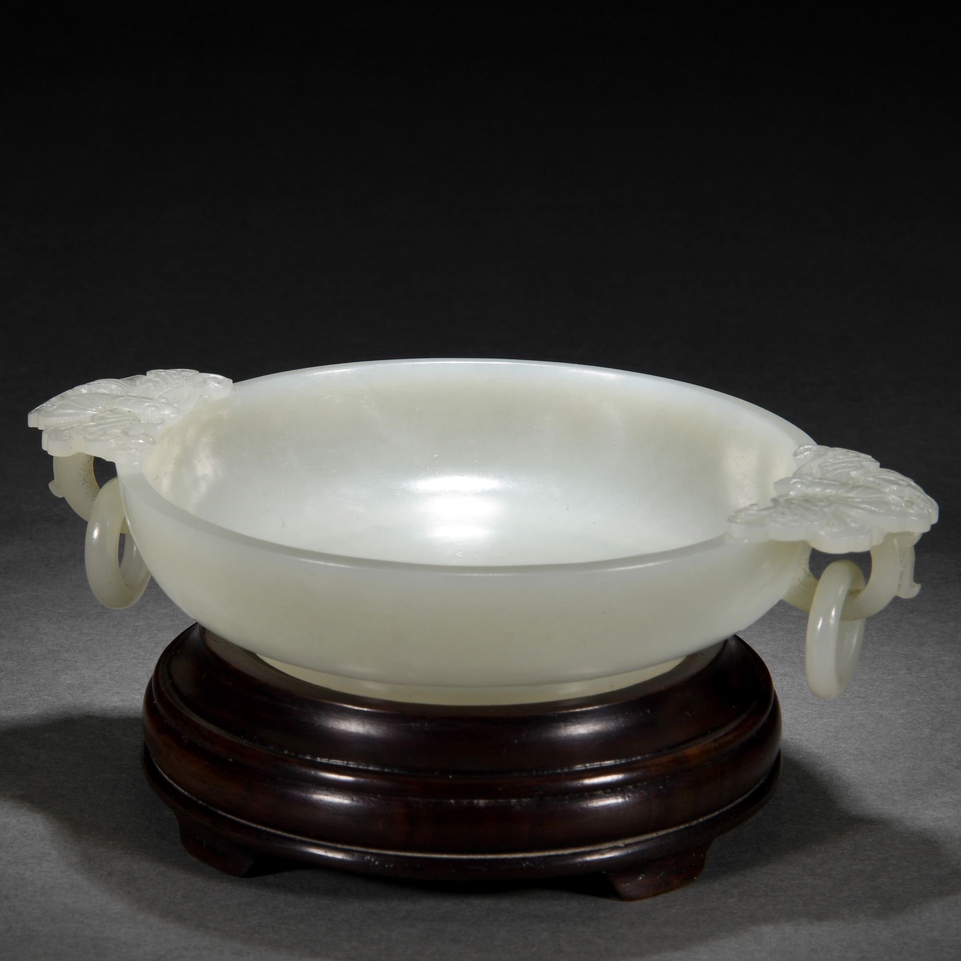 A Chinese Carved White Jade Washer with Double Handles