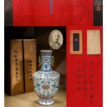A Chinese Doucai Glaze Lotus Scrolls Vase