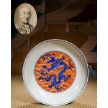 A Chinese Underglaze Blue and Copper Red Dragon Saucer