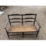 Morris & Co. an Arts & Crafts Ebonized Two-Seat Settee
