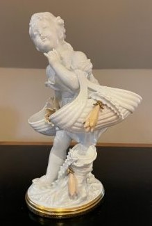 Large Moore Brothers Porcelain Cherub with Flowers