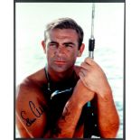 JAMES BOND SIGNED PHOTOS. signatures of actresses and actors who have featured in Bond films.