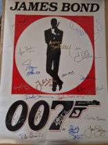 JAMES BOND SIGNED POSTER. Signatures include Sean Connery, George Lazenby, Roger Moore, Timothy