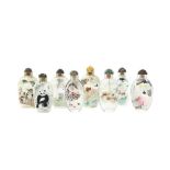 A GROUP OF EIGHT CHINESE INSIDE-PAINTED GLASS SNUFF BOTTLES 二十世紀 內畫玻璃鼻煙壺一組八件