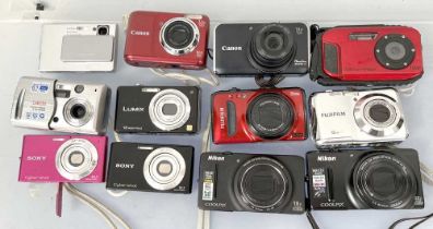 Group of 12 Compact Digital Cameras.