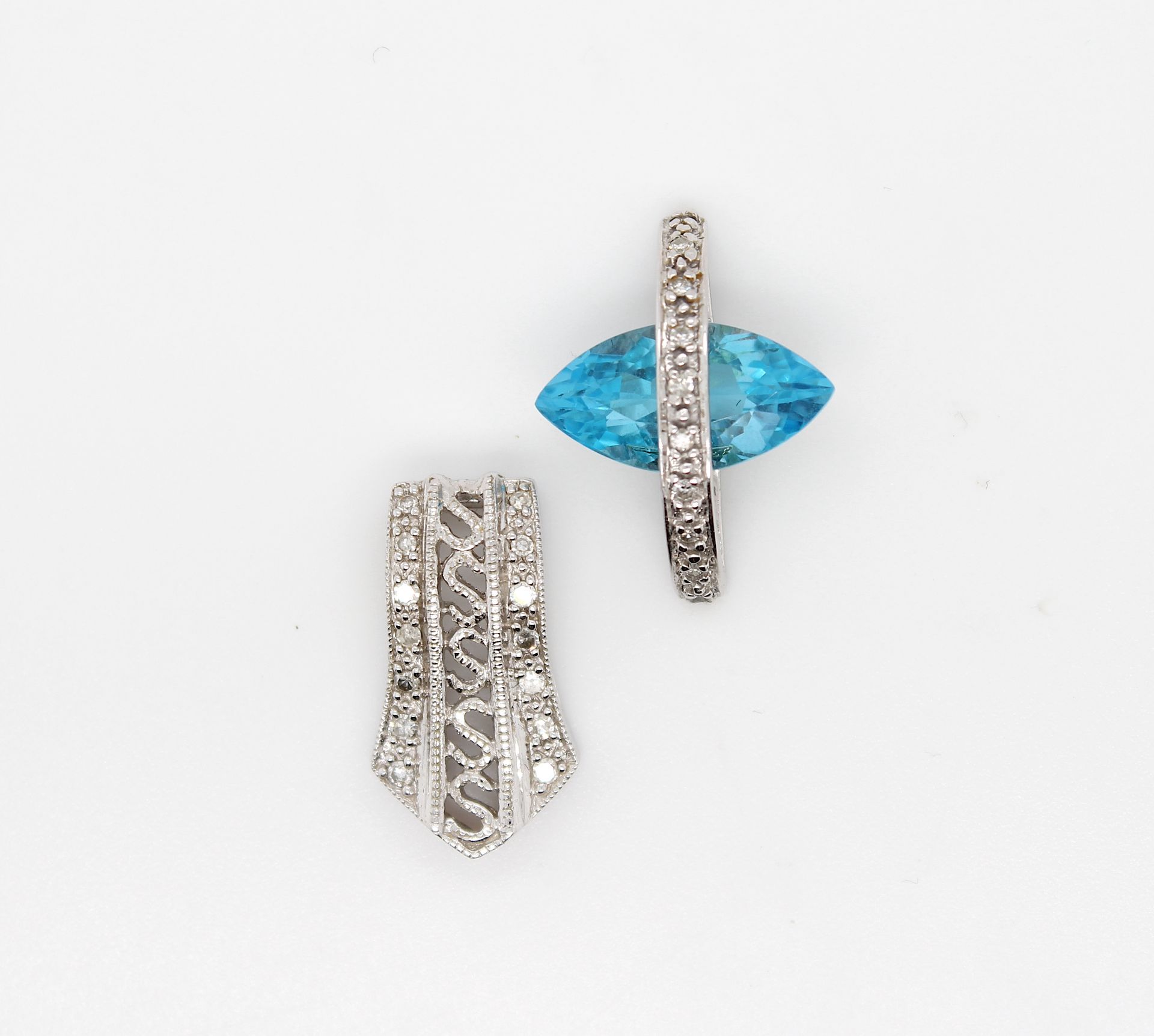 2 pendants with diamonds and topaz