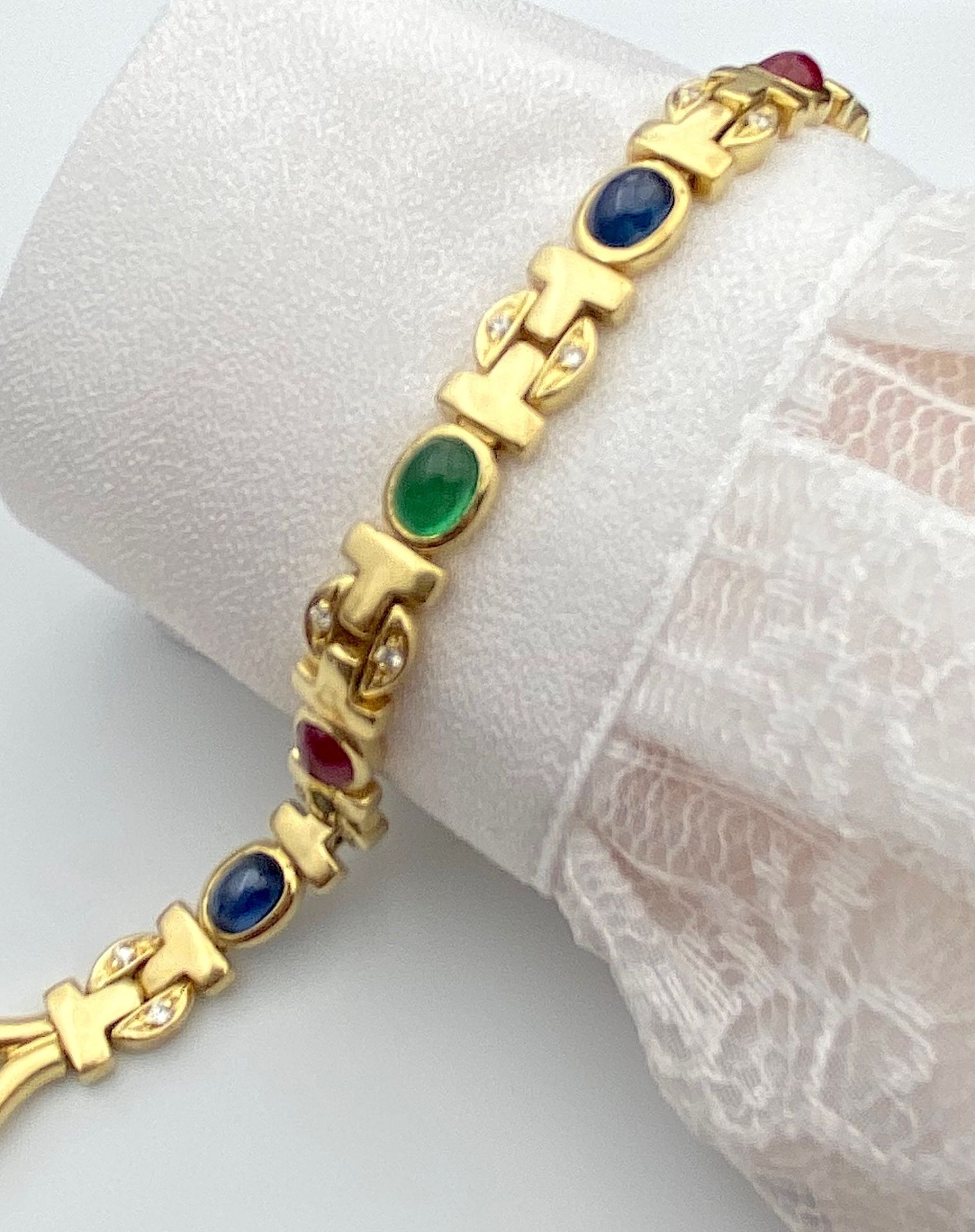 Bracelet with rubies, sapphires, emeralds and diamonds