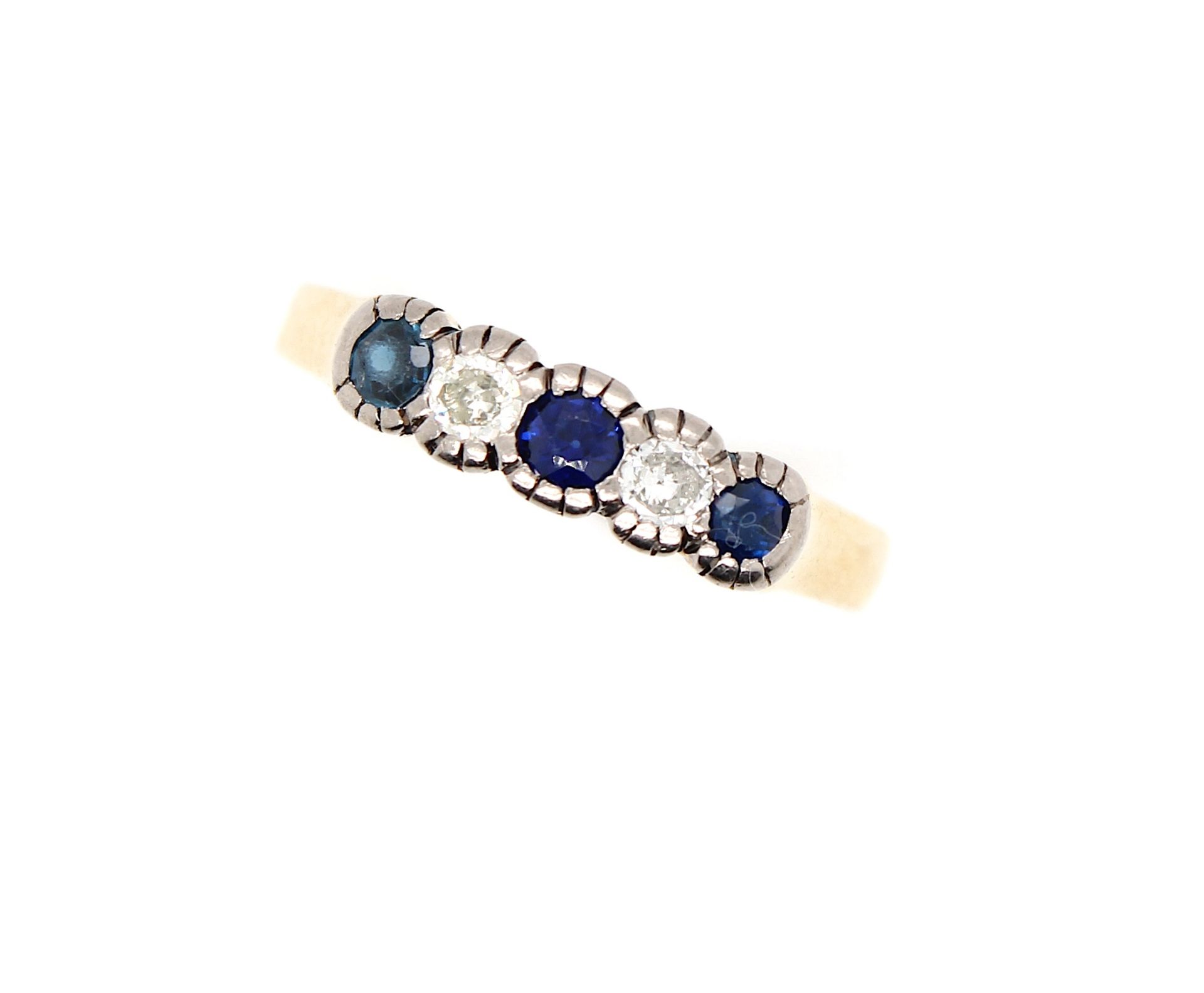 Vintage ring with sapphires and diamonds