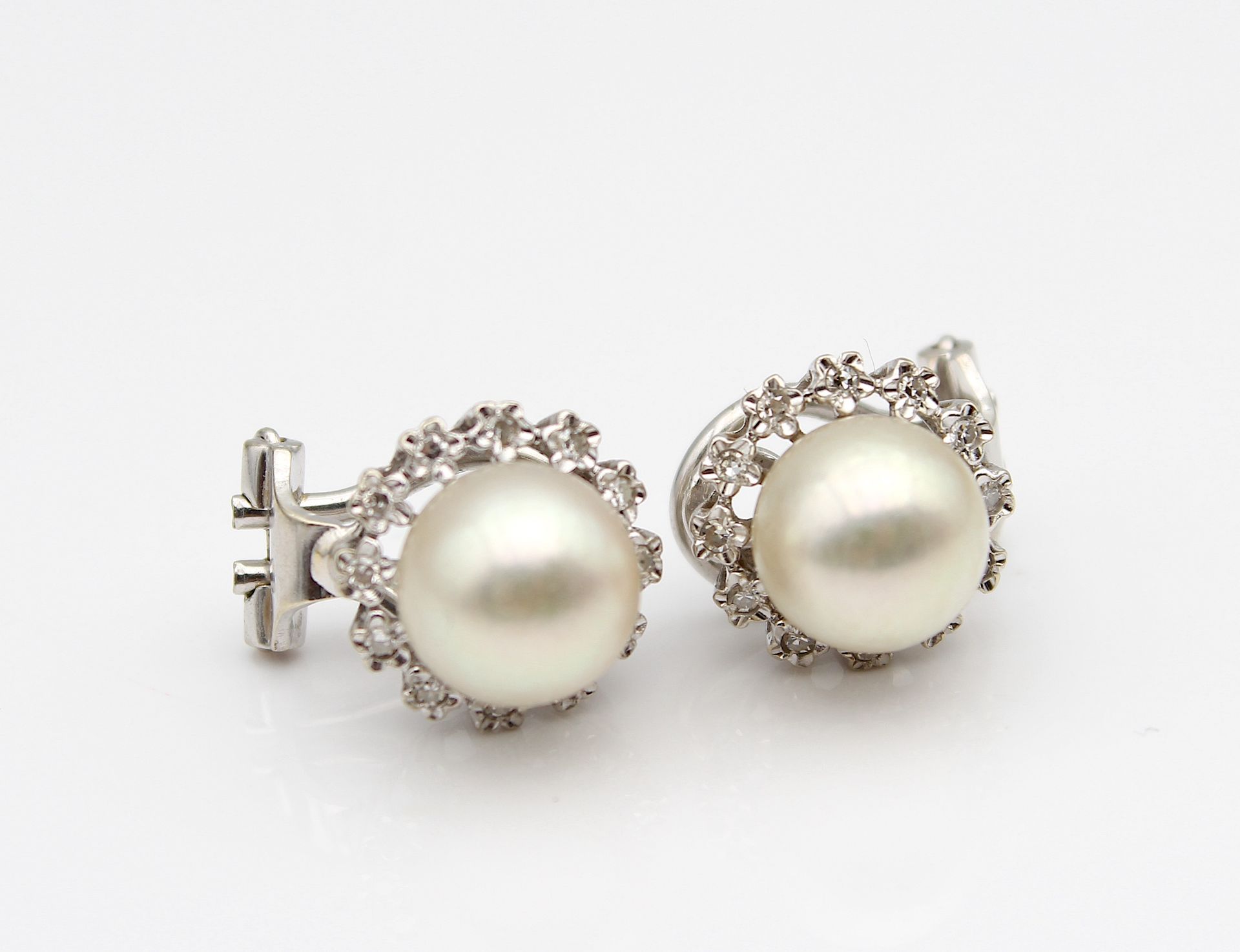 Great vintage earclips with cultured pearl and diamonds