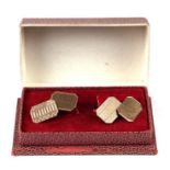 A pair of 9ct gold gentlemen's cufflinks with engine turned decoration, 3g, cased.