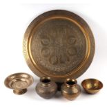 A quantity of assorted Persian / Islamic brassware to include a circular tray, 43cms diameter.