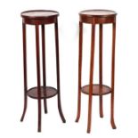 Two Edwardian inlaid mahogany plant stands (2).