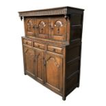 A late 18th / early 19th century Welsh Cwpwrdd Deuddarn court cupboard, the upper section with a