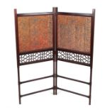 An Edwardian mahogany two-fold screen, overall 100 by 114cms.