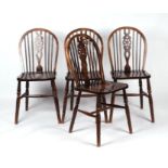 A set of six stained beech wheelback dining chairs (6).