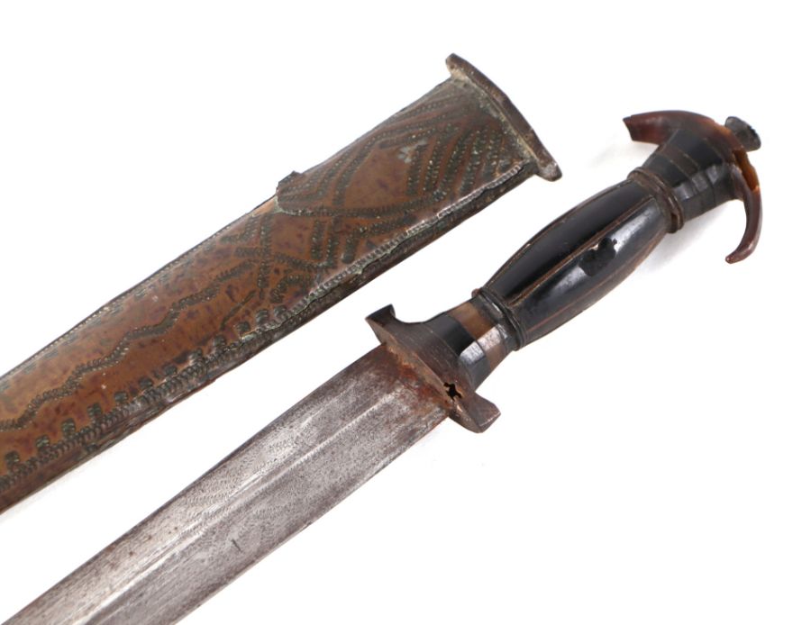 A North African tribal dagger with horn handle and metal scabbard, 57cms long; together with a - Image 2 of 2