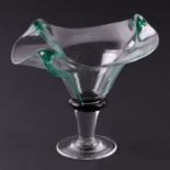 A Gillies Jones of Rosedale free-form glass pedestal vase with green ribbed decoration, signed &