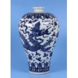 A large Chinese blue & white Meiping vase decorated with a dragon amongst scrolling foliage, six