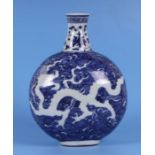 A Chinese blue & white vase decorated with dragons amongst waves, four character mark to side, 29cms