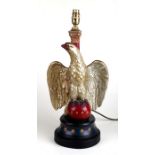A French Empire style eagle figural table lamp, 41cms high.