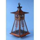 An Arts & Crafts brass hall lantern with glazed panels, 43cms high.Condition ReportGeneral wear, the