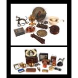 A mortar and pestle, a chrome plated figure of a dog, a gilt metal clock, a brass safe plaque and