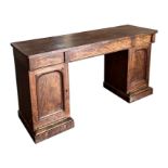 A William IV mahogany twin pedestal sideboard of large proportions with three frieze drawers on twin