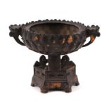 A Chinese bronzed metal lotus flower pedestal bowl, 9cms high.