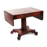 A Regency rosewood sofa table with rectangular top and drop-flaps and single frieze drawer, on a