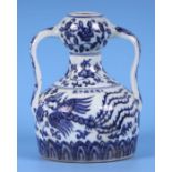 A Chinese blue & white two-handled vase decorated with a phoenix and flowering foliage, six