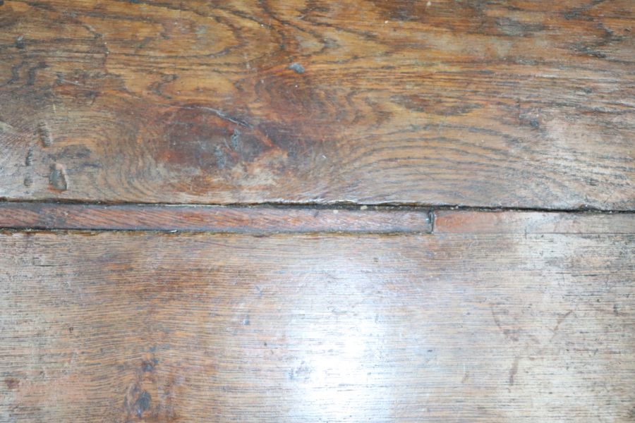 A large 17th century style oak refectory table with four plank top, on trestle supports joined by - Image 14 of 20