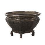 A Japanese bronze octagonal form censer with character mark to base, 17cms wide.