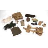 A quantity of assorted military webbing items to include haversacks, kit bags and other similar