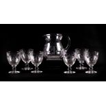 A set of six large glasses with matching jug finely engraved with George VI cypher, Coronation