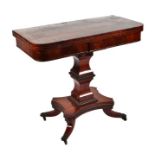 A Regency mahogany card table, the fold-over rounded rectangular top on an architectural column,