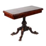 A 19th century burr walnut card table on turned column and quatrefoil base, 92cms wide.