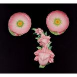 A Carltonware wall pocket in the form of a spray of flowers, 30cms high; together with a pair of