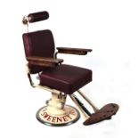 A barber's chair with adjustable hydraulic rise-and-fall column, adjustable head-rest and foot