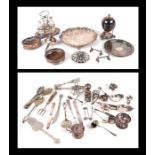A quantity of assorted silver plated items to include a salver, four-piece cruet set, wine funnel,