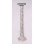 A figured white marble column, 100cms high.