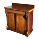 A Victorian mahogany chiffonier with single frieze drawer above two panelled doors enclosing a